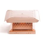 Close-up of a polished copper chimney cap with mesh sides, providing rain and wind protection while adding a luxurious finish.