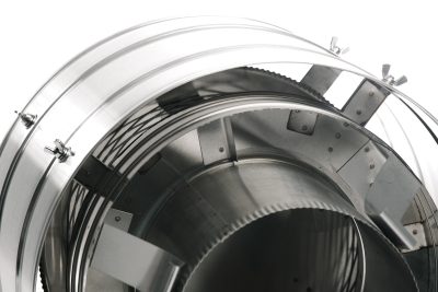 Precision-engineered stainless steel non-air-cooled chimney cap with wind-deflecting shield for consistent draft and moisture protection.